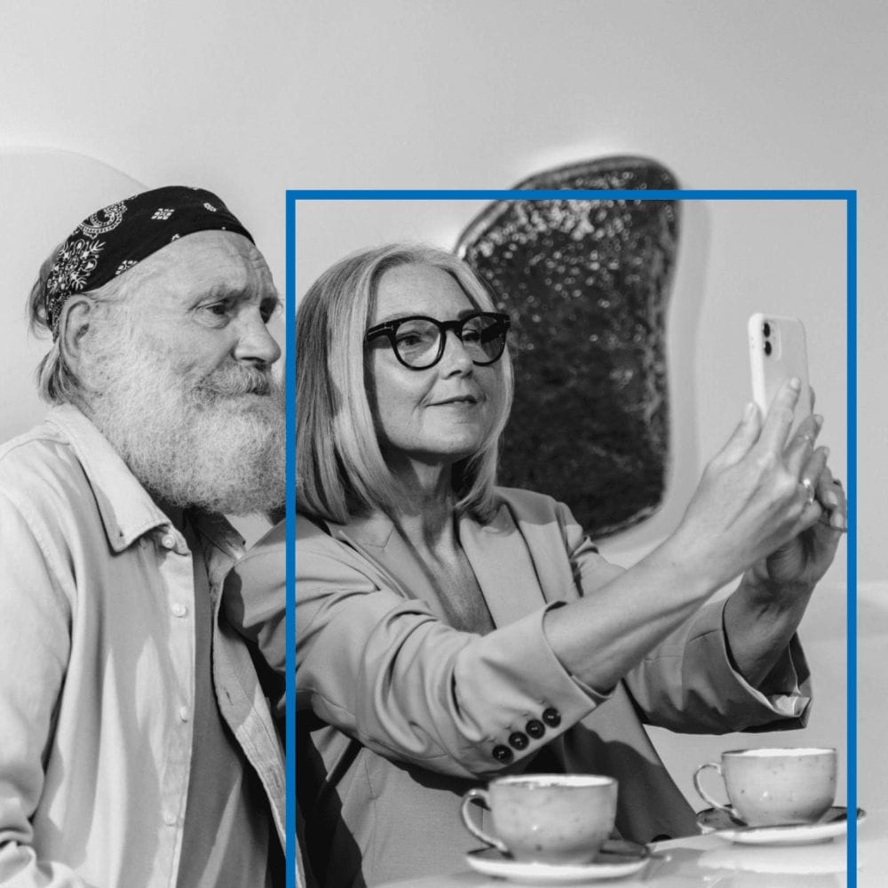 Two workplace influencers take a selfie