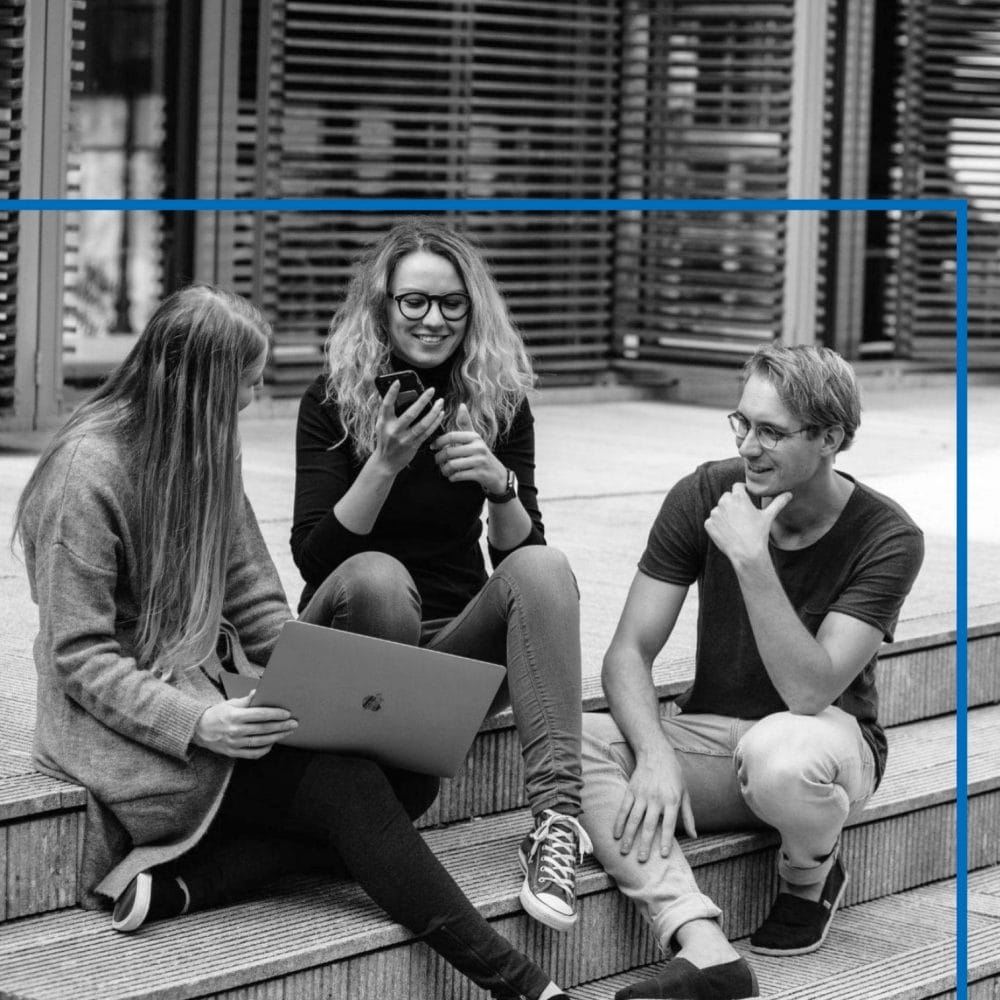 A group of people smiling