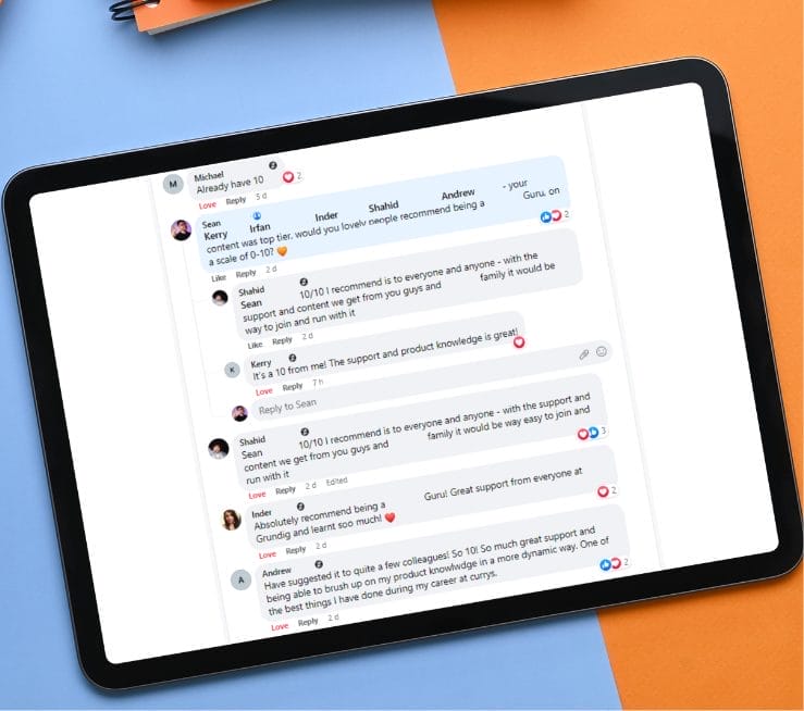A tablet showing Facebook comments