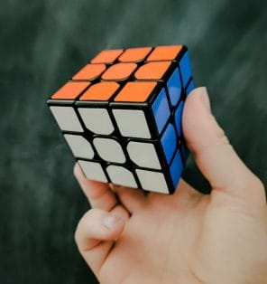 A right and holding Rubix cube puzzle
