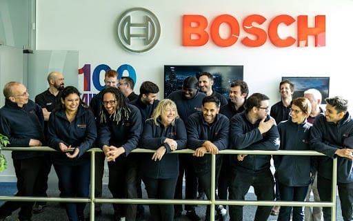 The Channel Assist team laughing together